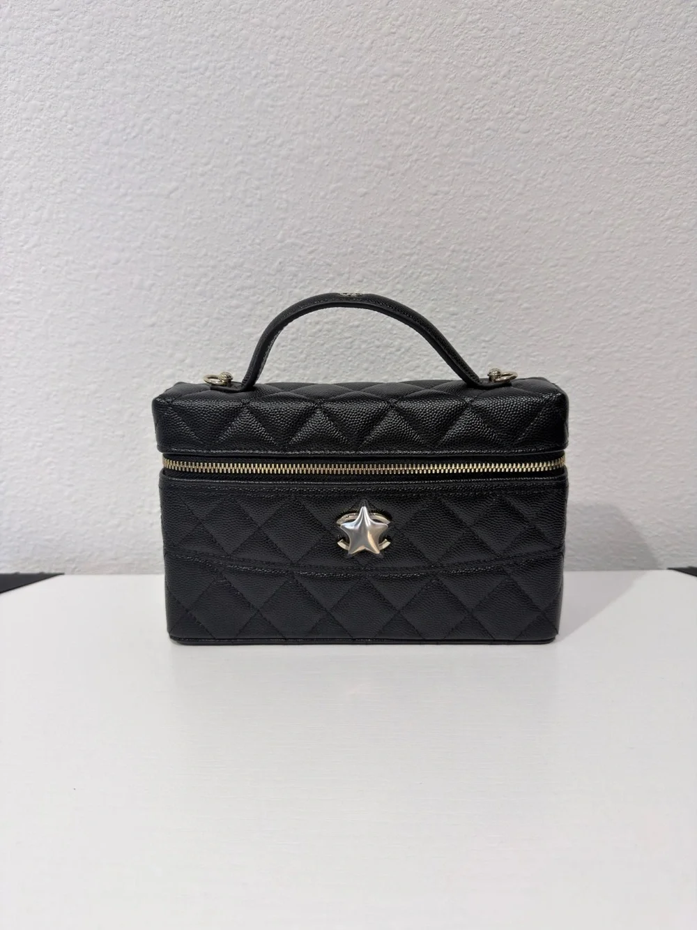 Quilted Black Top-Handle Vanity Bag